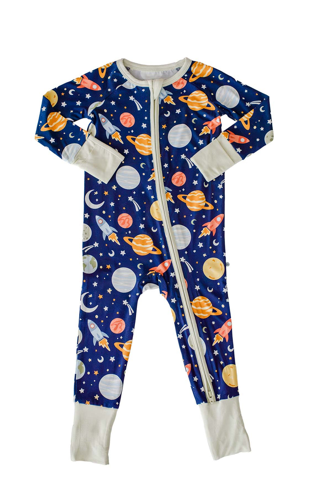 Flat lay of a Caden Lane navy bamboo two-way zip romper in a Stellar Snuggles print featuring planets, rockets, moons, and stars, with cream trim and cuffs.