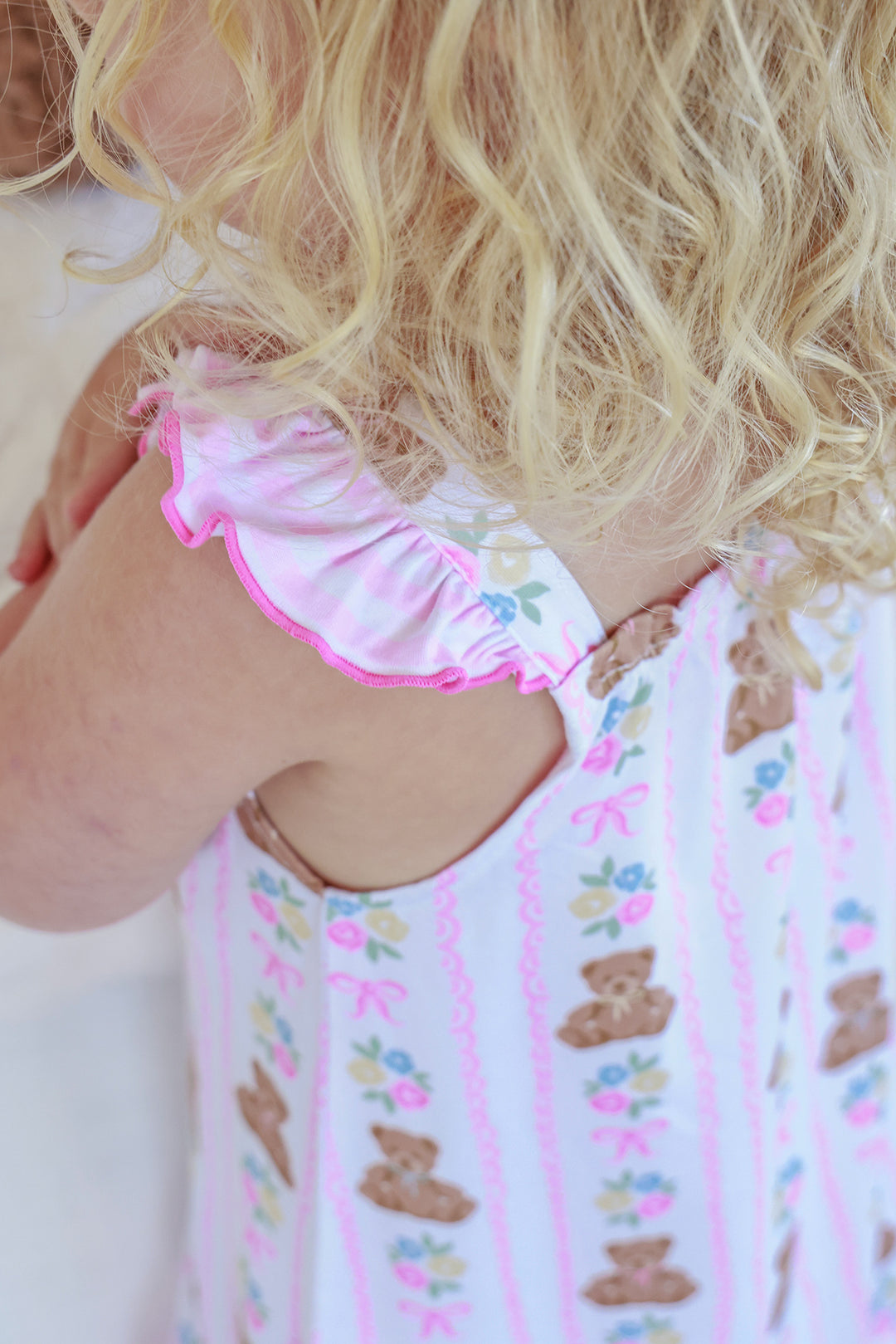 Close-up of flutter cap sleeve detail on Full Length Ruffle Nightgown in Beary Lovely print with teddy bear and bow stripe pattern