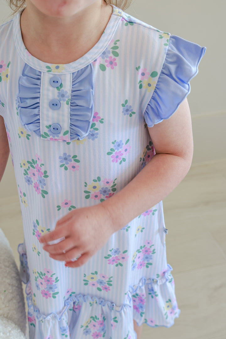 Close-up of Flutter Sleeve Nightgown in Heirloom Posies showing ruffled button collar detail, flutter sleeve and pink and blue floral print