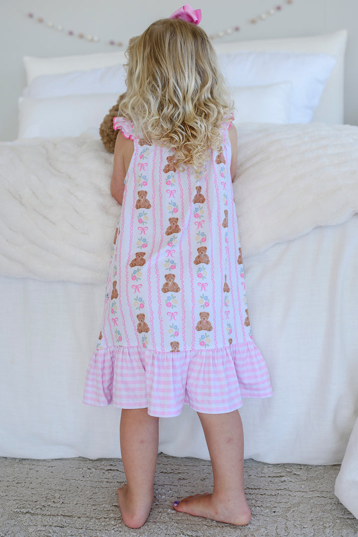 Front body view of Full Length Ruffle Nightgown in Beary Lovely print showing teddy bear and bow stripe pattern and pink gingham ruffle hem detail