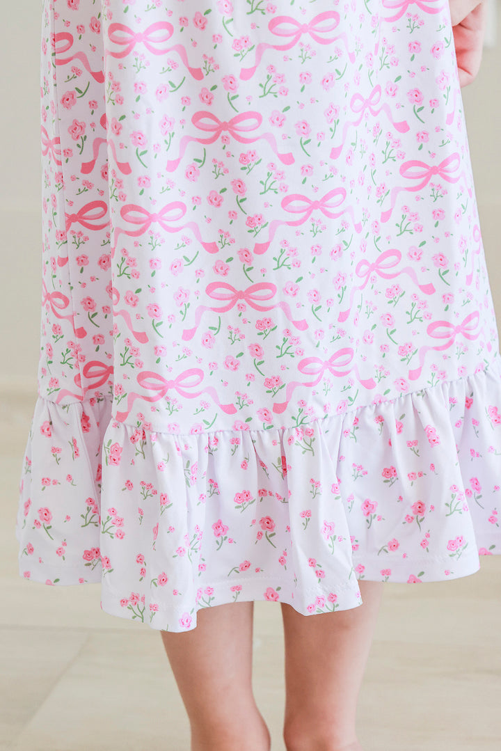 Young girl wearing Full Length Ruffle Nightgown in Dreamy Bows pink and white print, flutter cap sleeves, full length dress view