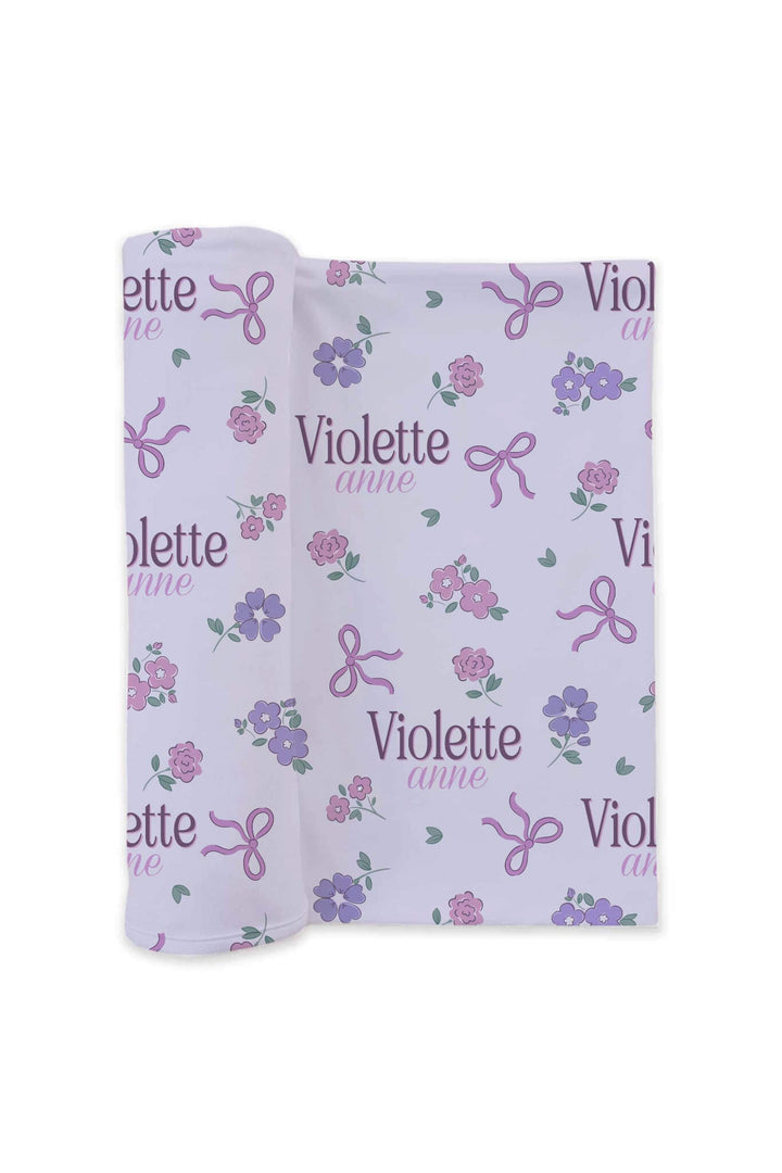 flower and bow personalized swaddle blanket for girls in purple 