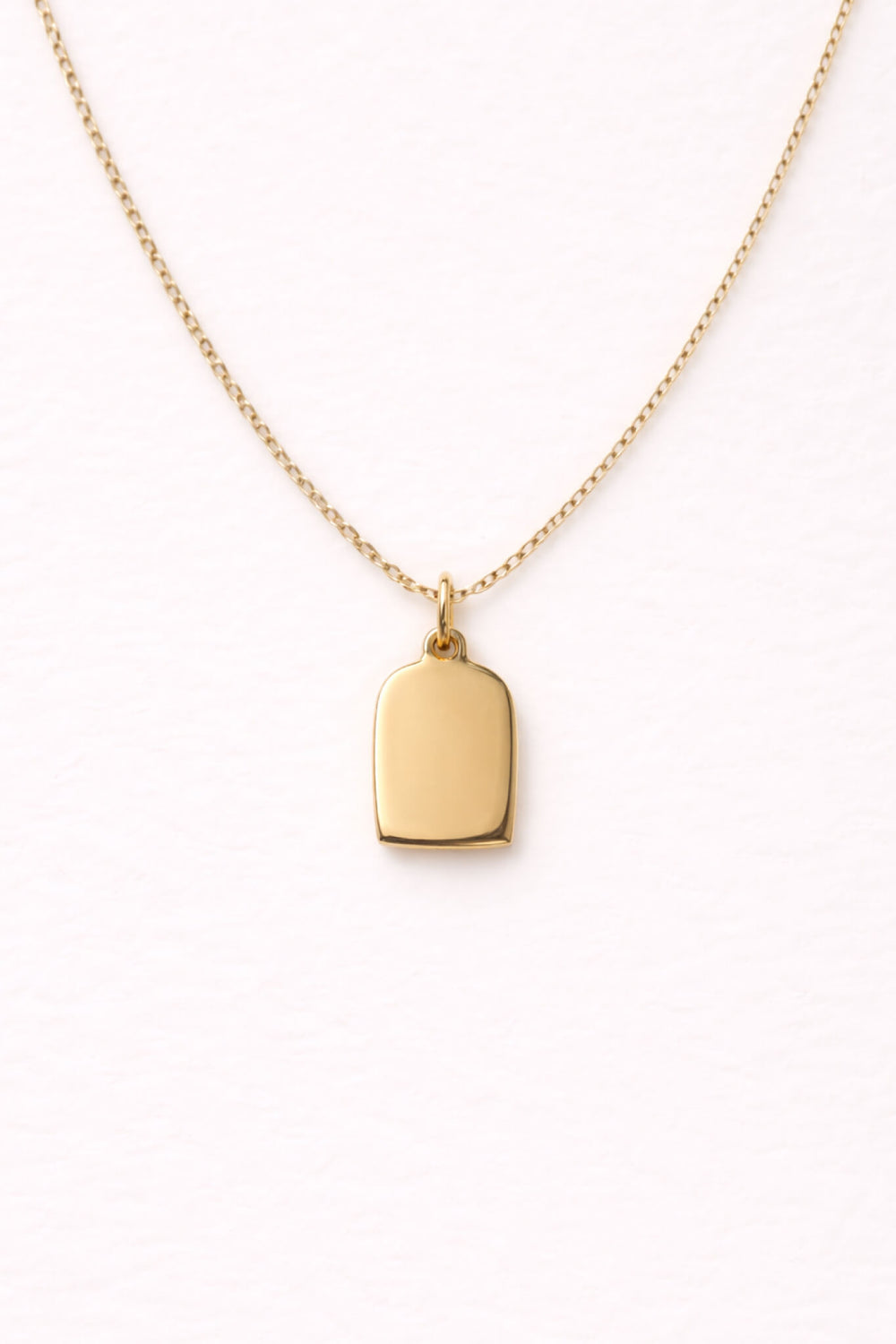 Caden Lane gold necklace with a blank engravable tag charm pendant