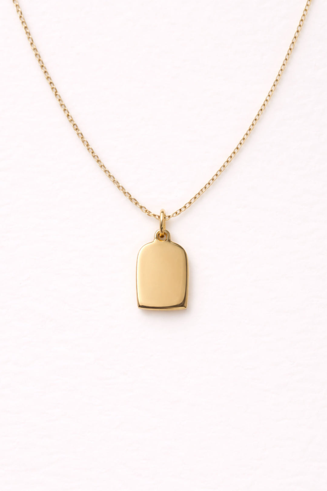 Caden Lane gold necklace with a blank engravable tag charm pendant
