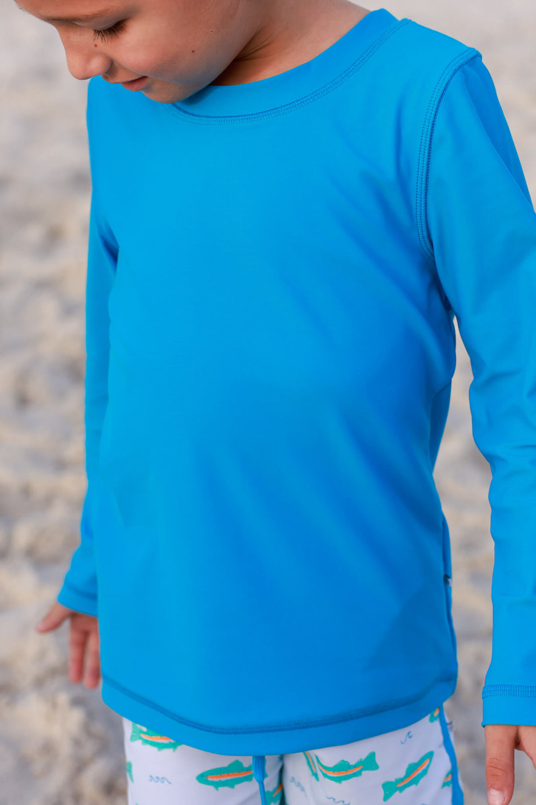 closeup of twilight tide long sleeve rash guard shirt 