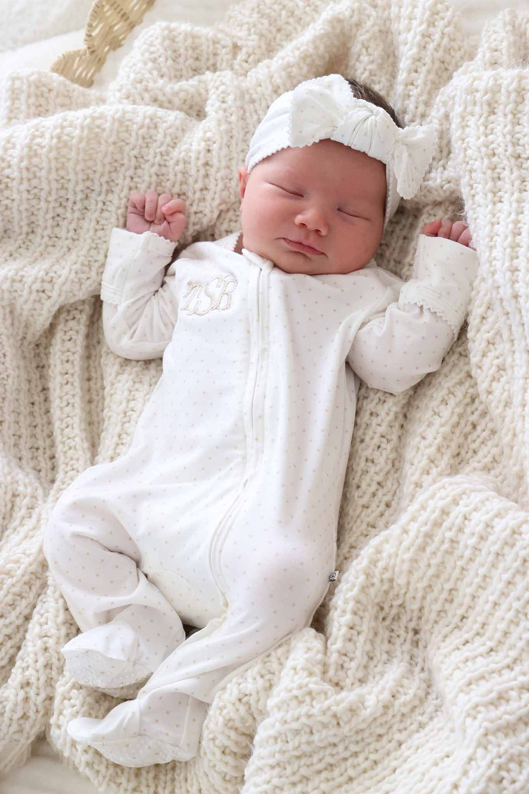 baby wearing taupe picot trim knit large bow headwrap