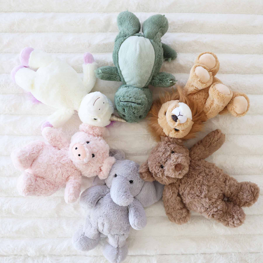 unicorn, dinosaur, lion, teddy bear, elephant and pig stuffed animal group for kids 