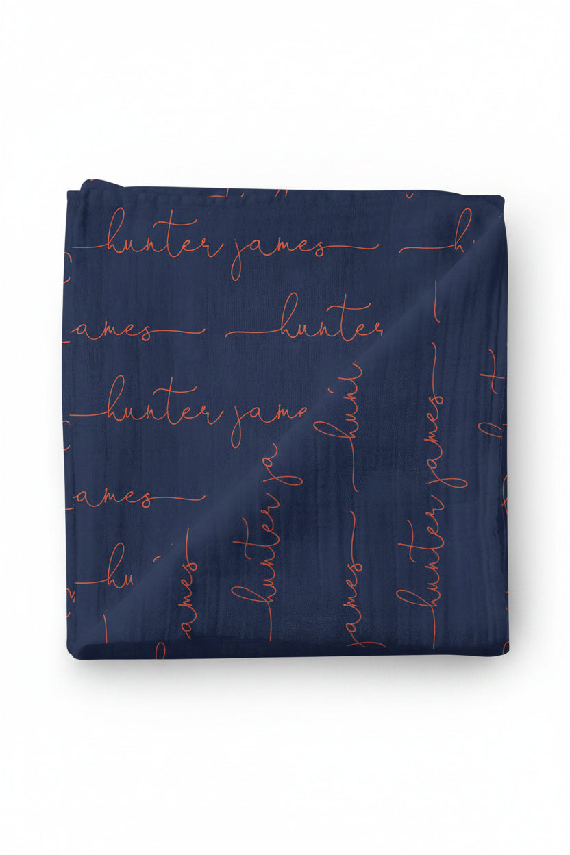 orange and blue personalized swaddle blanket