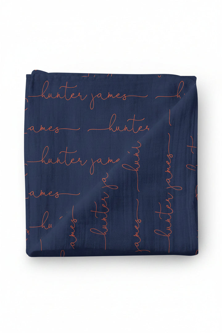 orange and blue personalized swaddle blanket