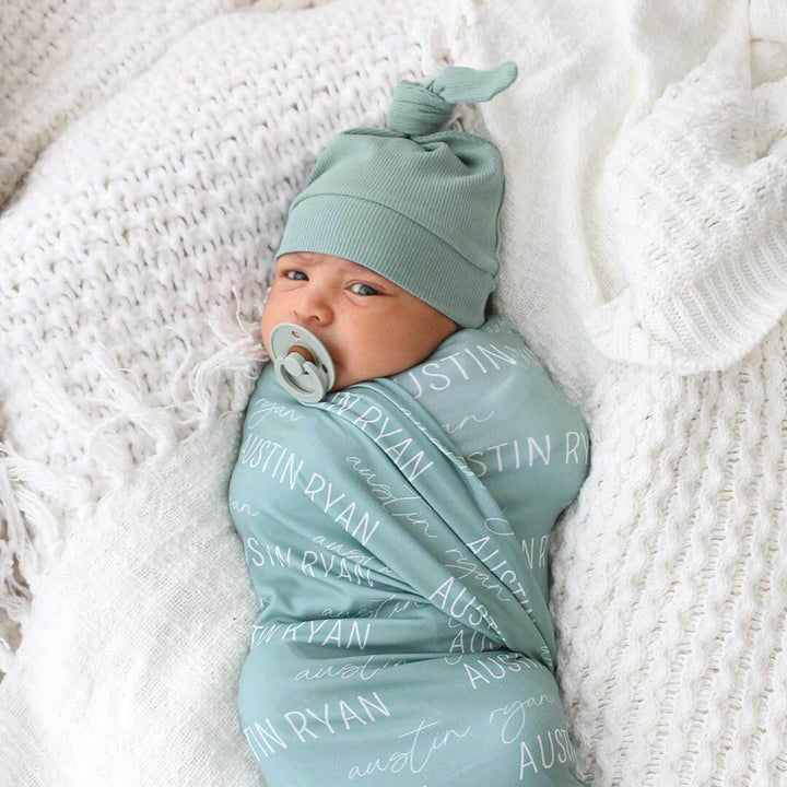 vintage green personalized swaddle blanket block and script 