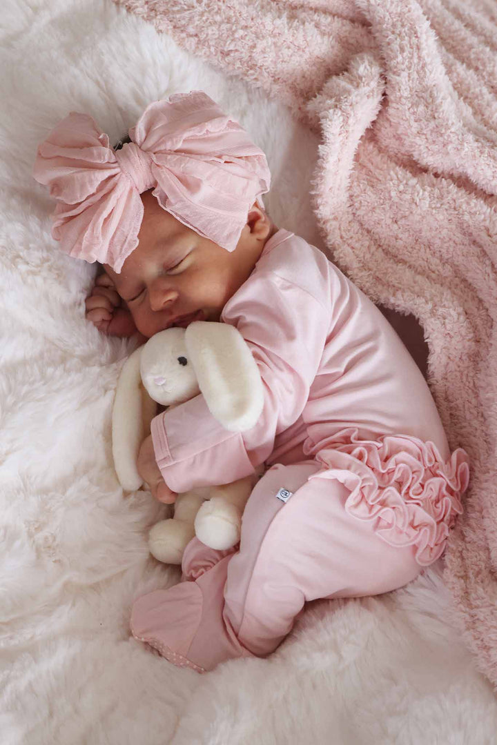 baby pink bamboo viscose ruffle zipper footie for girls 