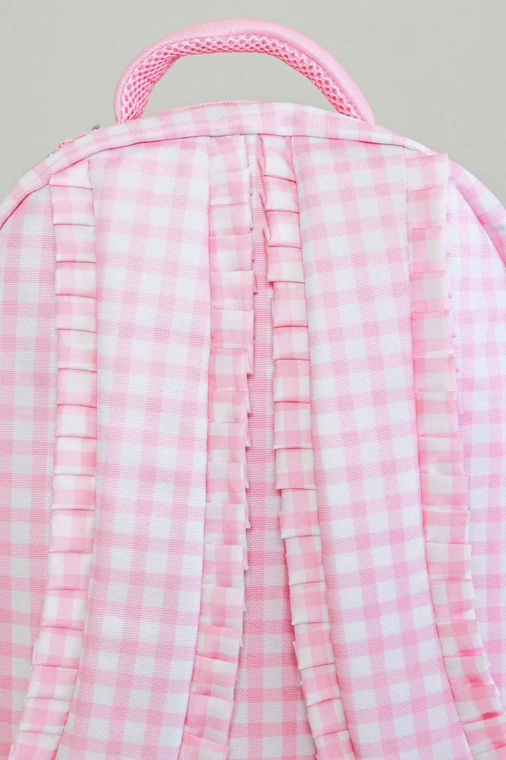 back view of pink gingham backpack 