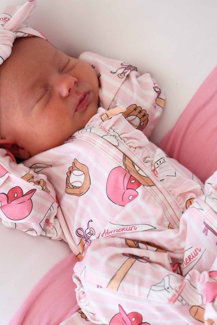 pink and white stripes baseball footie pajama for girls with helmets, bats, bows and flag banners