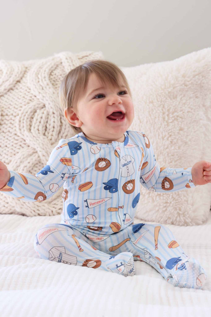 sitting baby boy in ballpark bros bamboo zipper footie 