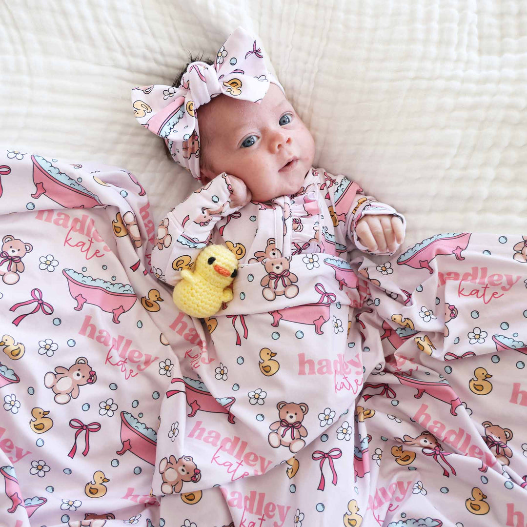 pink bath time themed personalized name swaddle for babies 