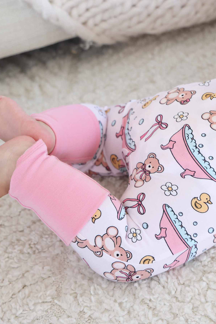 baby zip romper with flip mitts and footies pink bathtime besties 