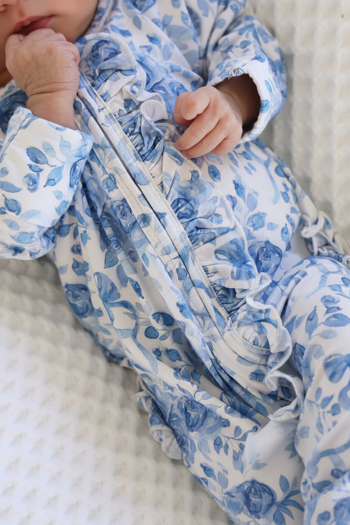 bamboo viscose blue and white floral and bow zipper footie for girls with ruffles