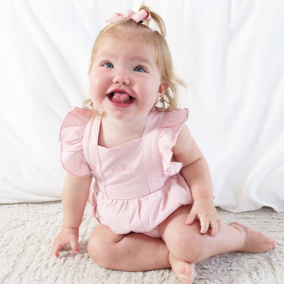 light pink ruffle romper for girls 
