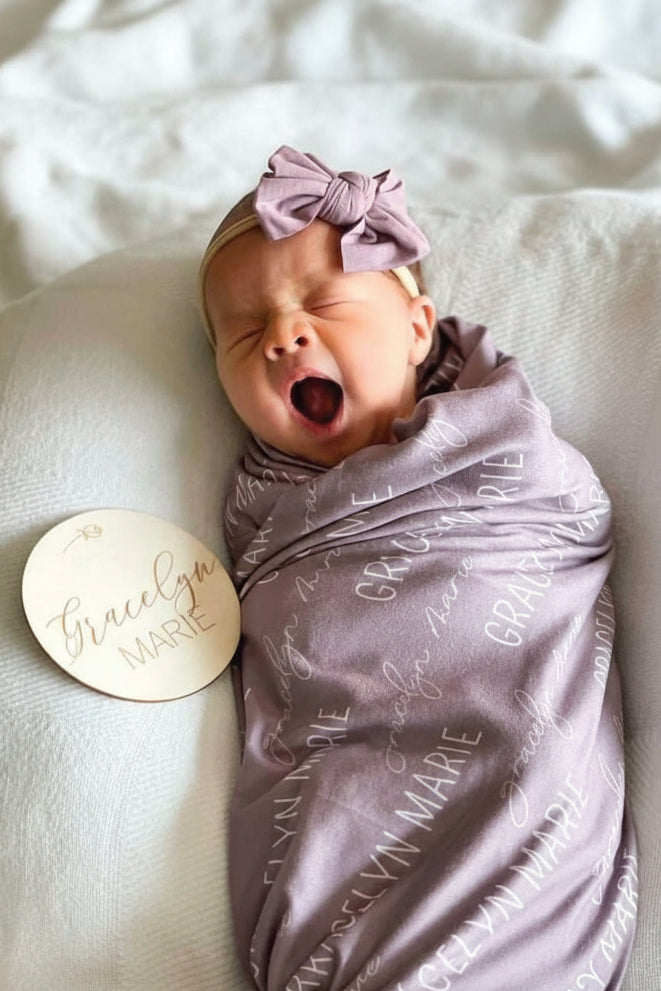dusty purple baby name swaddle 