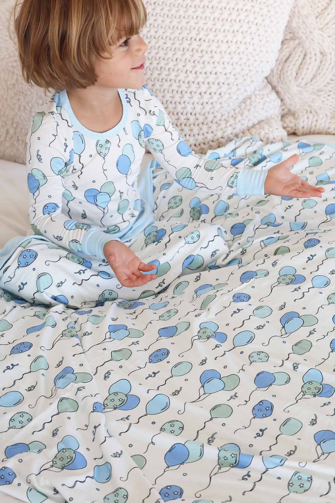 blue and green balloon and streamer birthday blanket for boys 