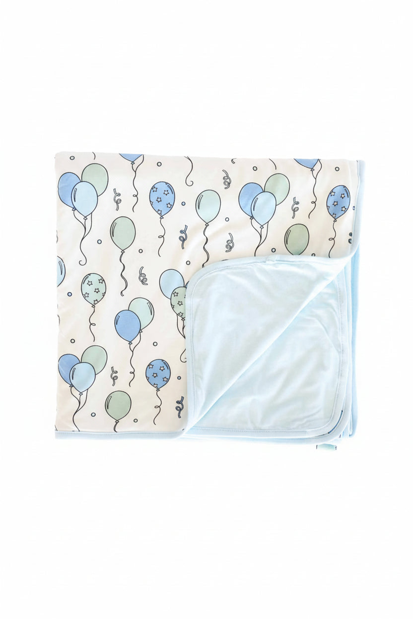 blue and green balloon and streamer double sided bamboo blanket 
