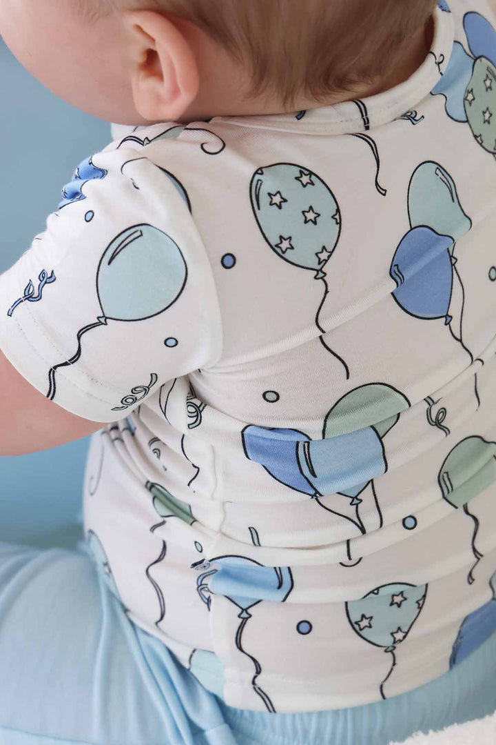 short sleeve shirt with blue and green balloons with matching light blue shorts 