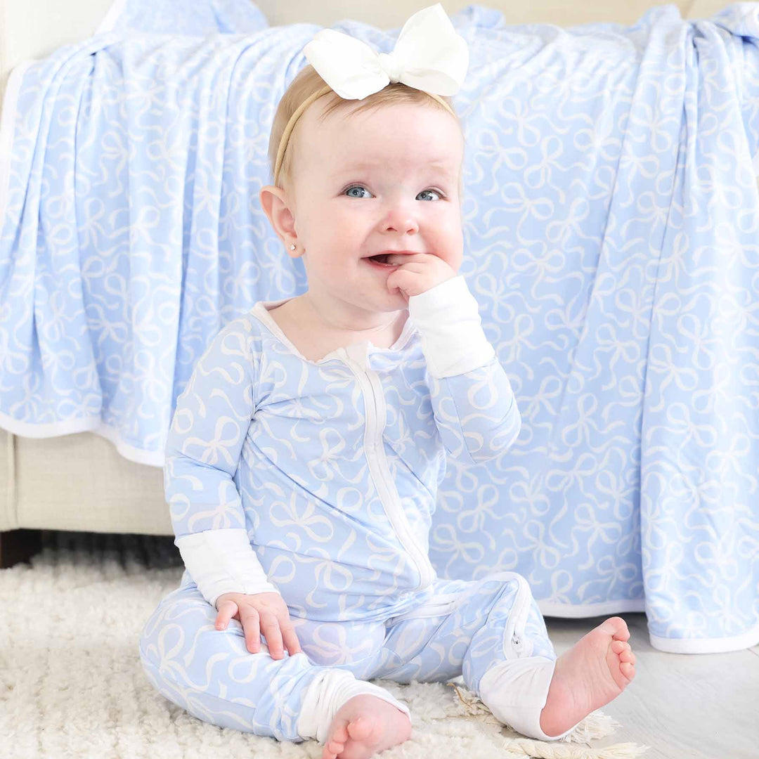 light blue and white bow bamboo pajama romper 