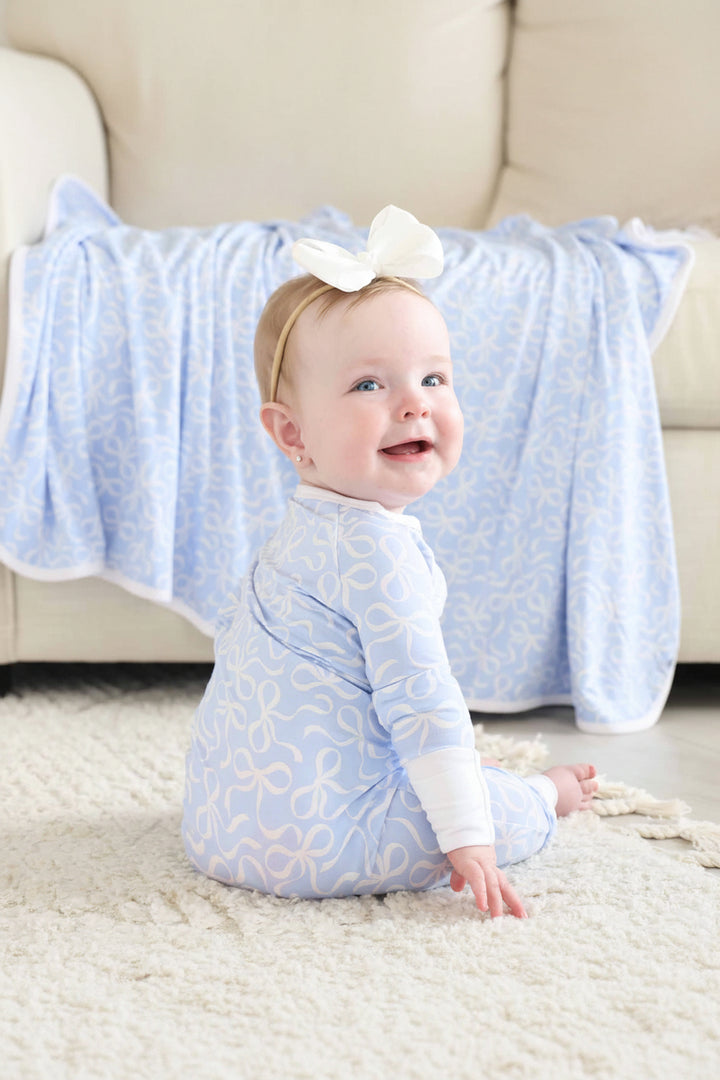 light blue bamboo blanket with white bows for girls 