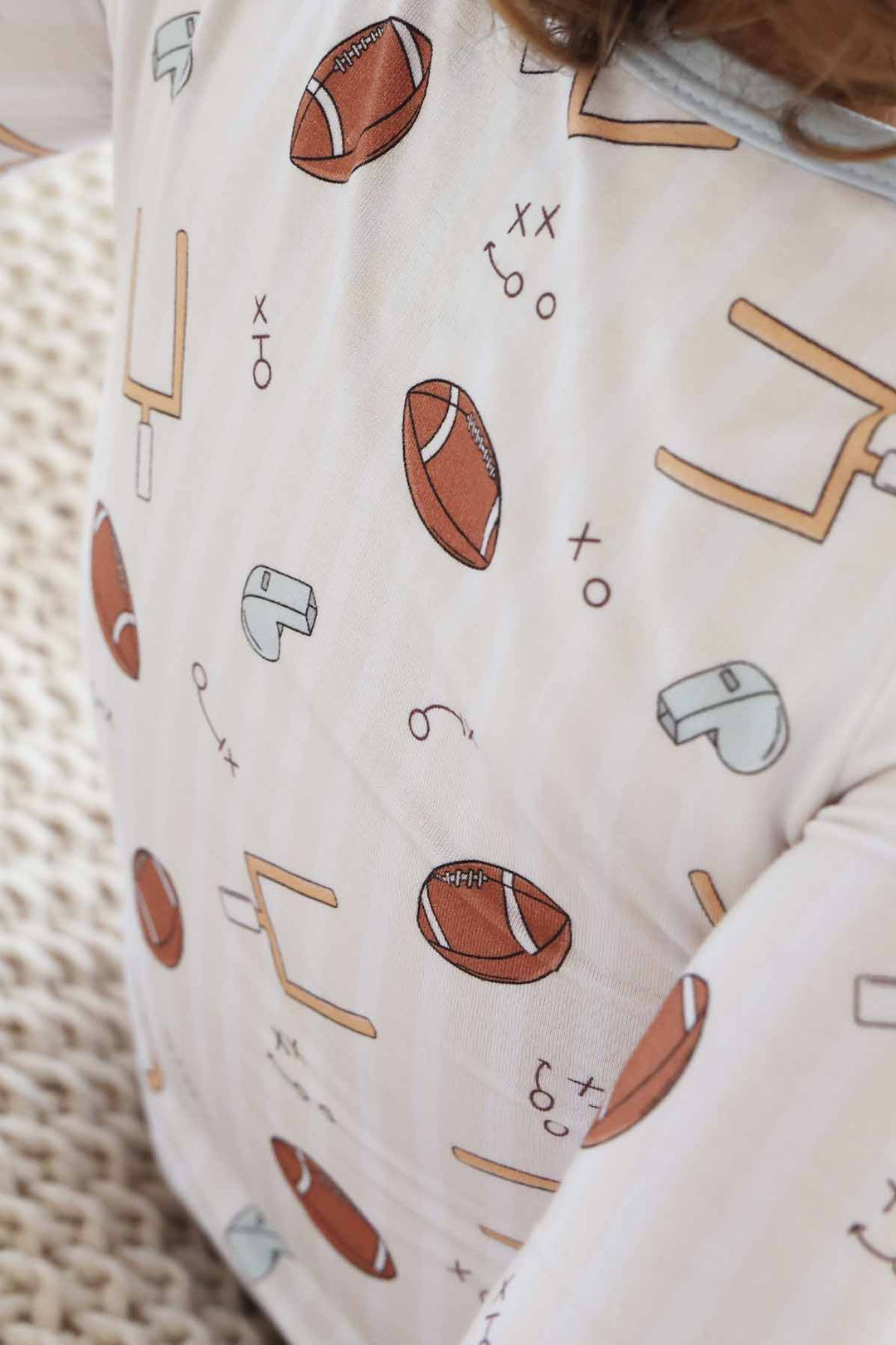 pastel football neutral pajamas for kids 