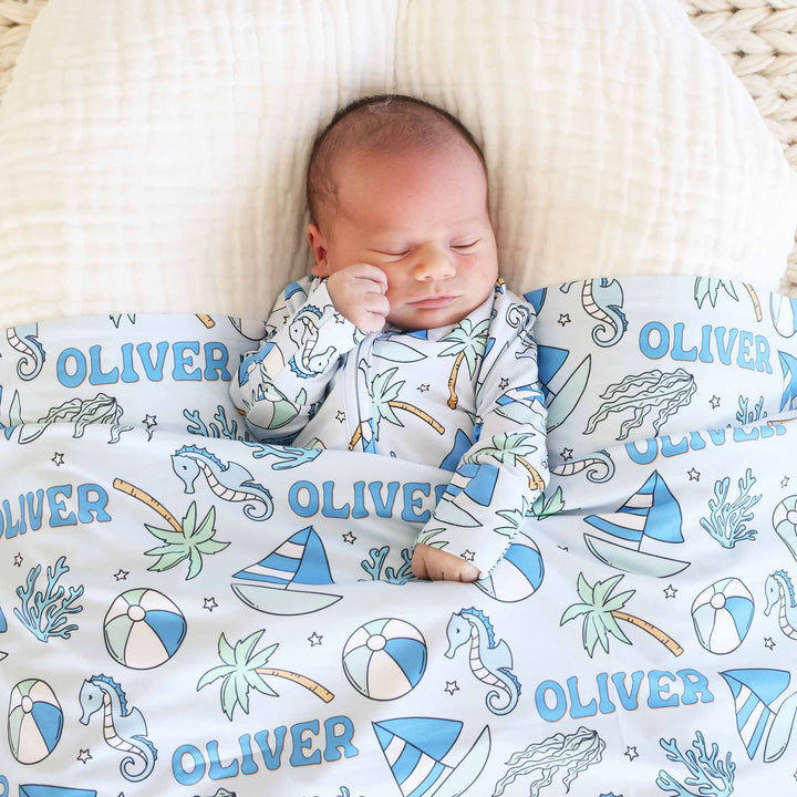 blue tiny tides personalized swaddle blanket with name 