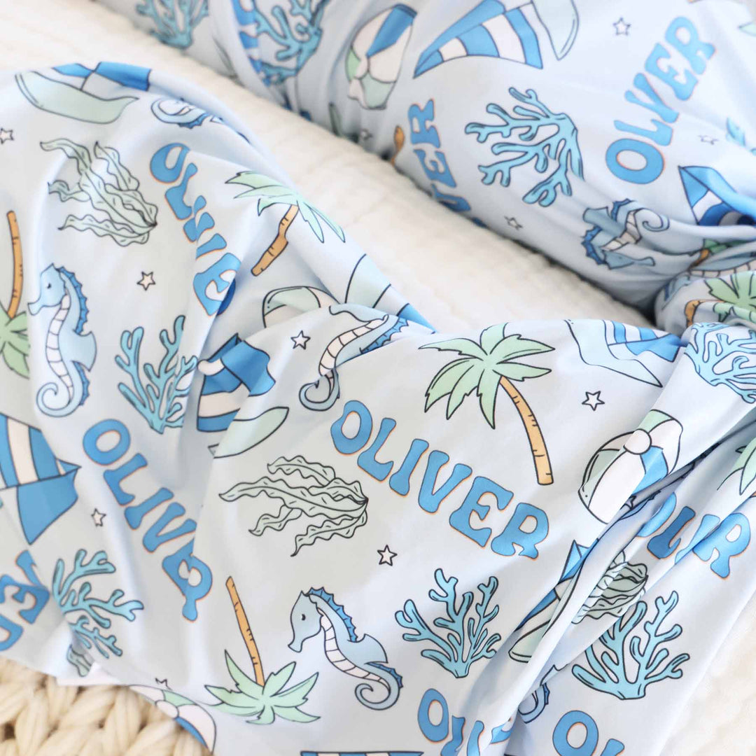 blue tiny tides personalized swaddle blanket for boys 