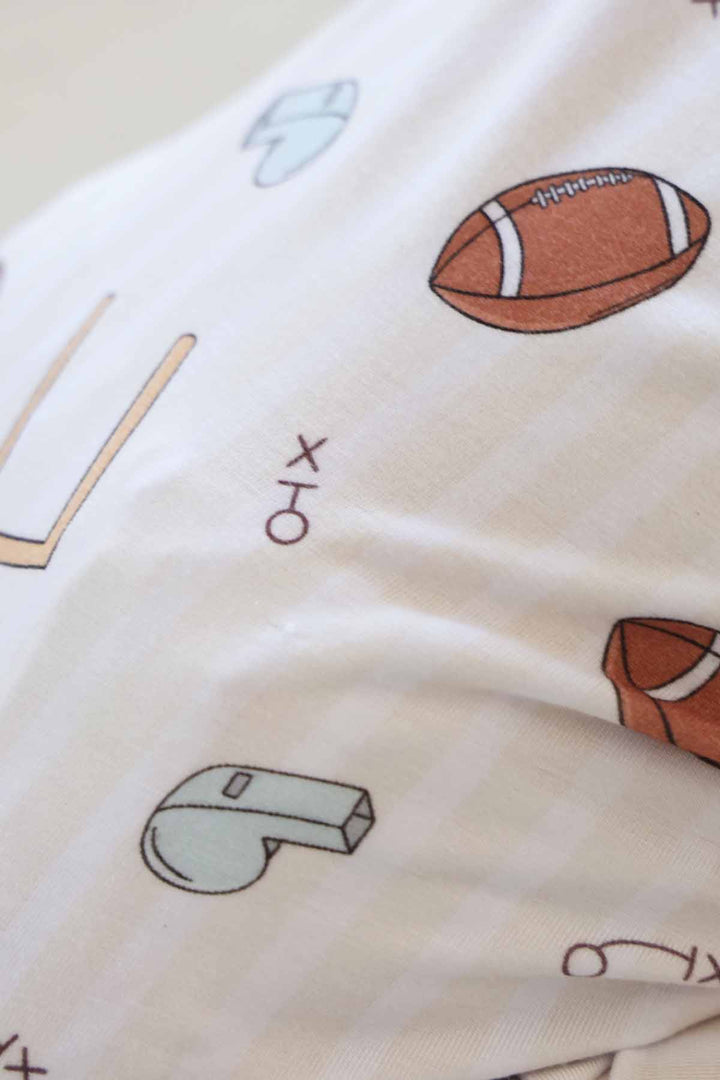 neutral tiny touchdowns convertible zip romper pajama for babies 