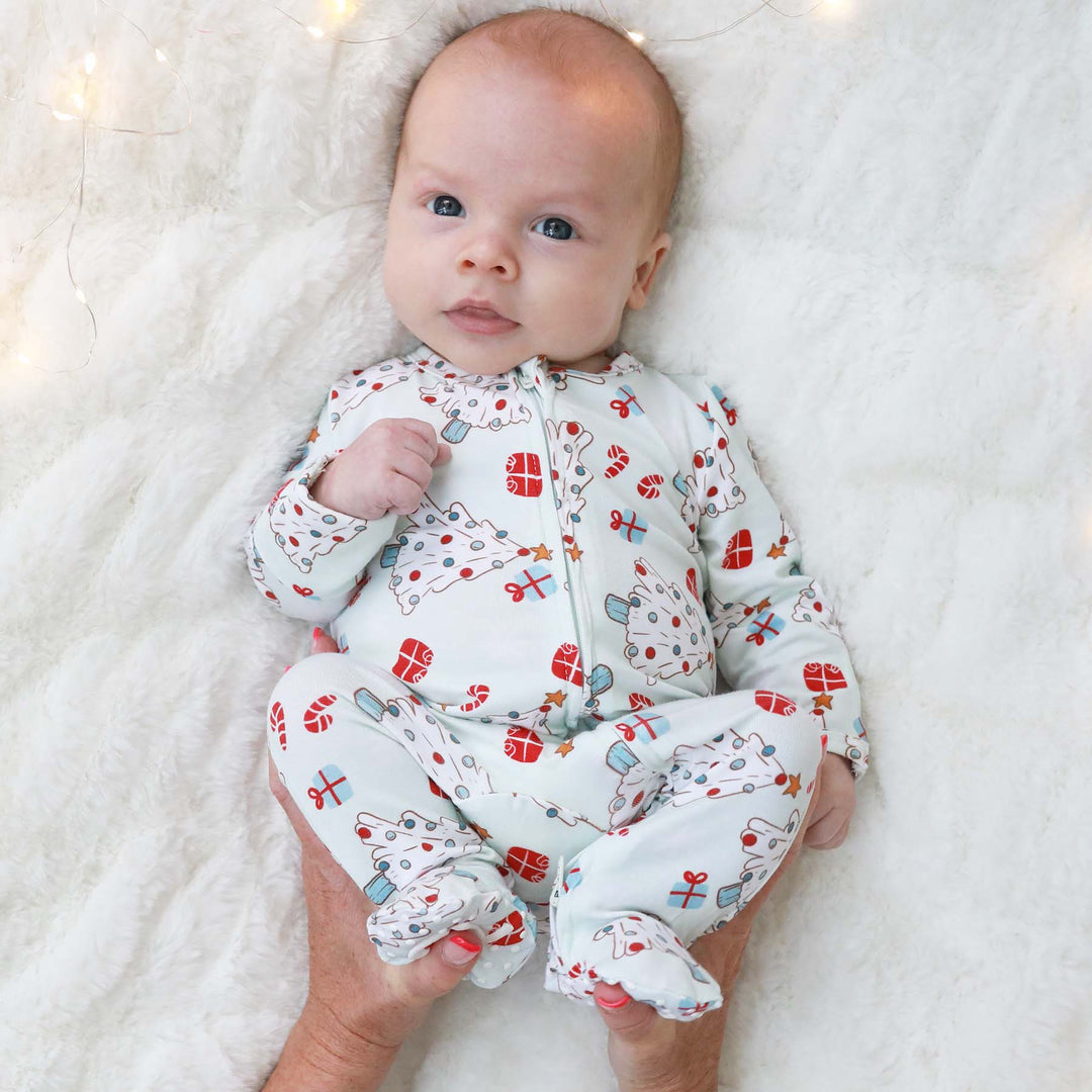 baby christmas footie blue with christmas trees and presents 