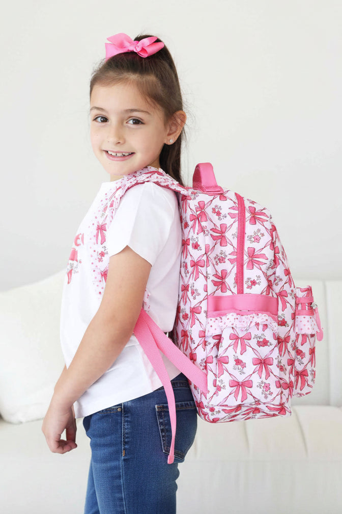 pink bow and floral backpack for girls with polka dot trim 