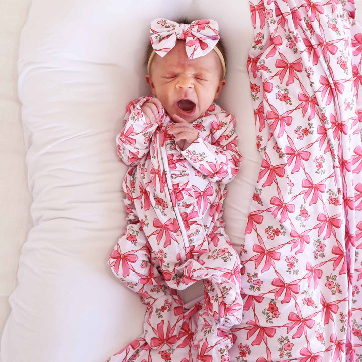 mom and baby matching pajamas pink bows and flowers 