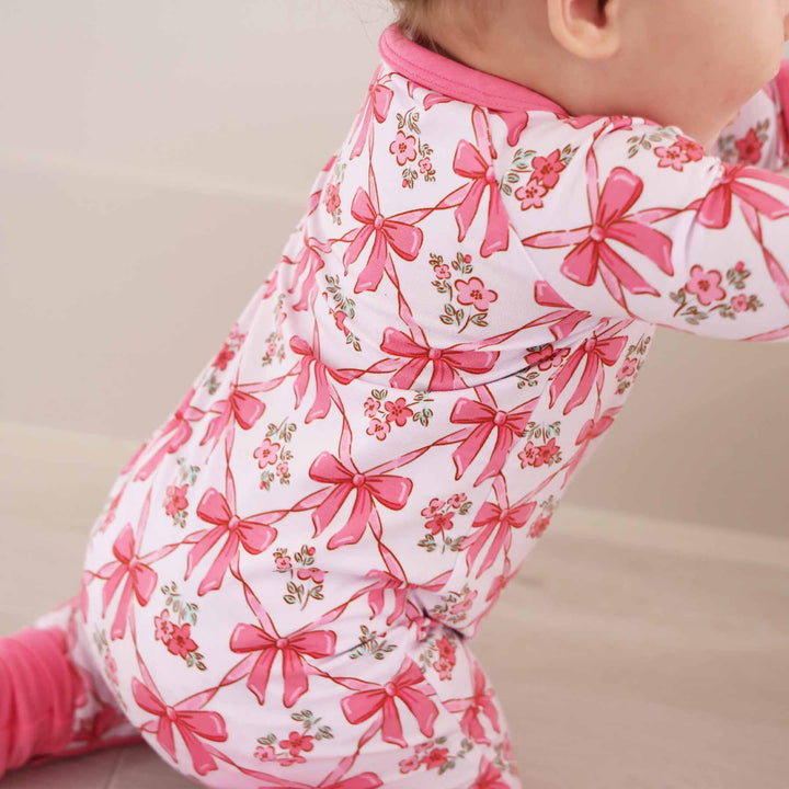 bows and flower print romper for babies