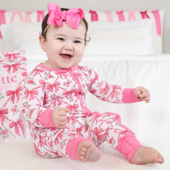 babies full zip romper with pink trim and bows print for girls