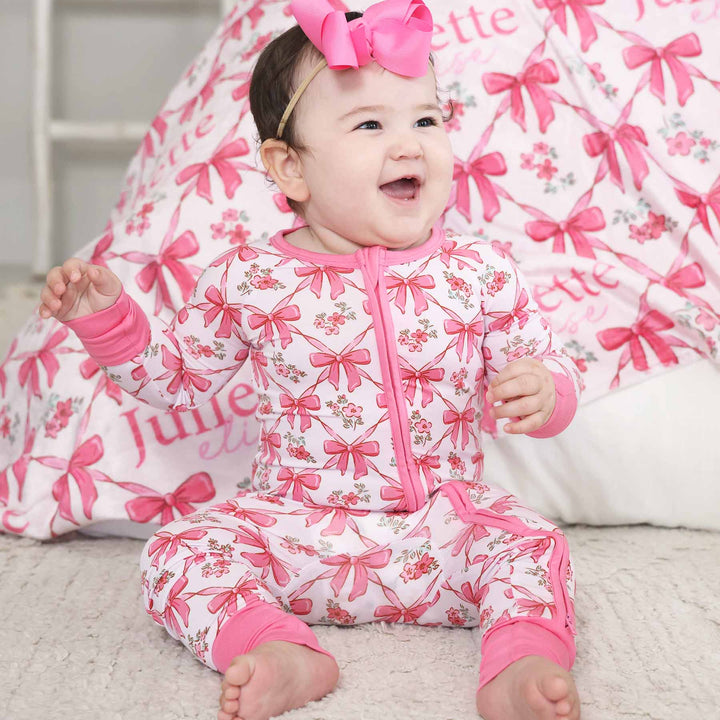 babies printed full zip romper with pink trims and bows