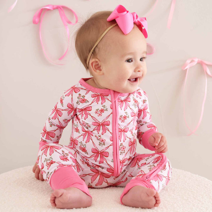 baby girls full zip romper with bows and flowers