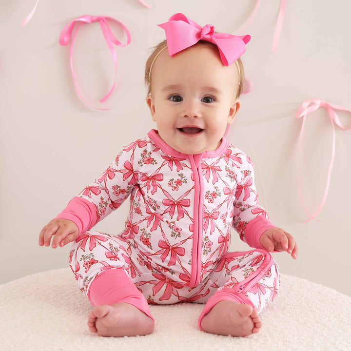 baby zip romper with bows and flowers