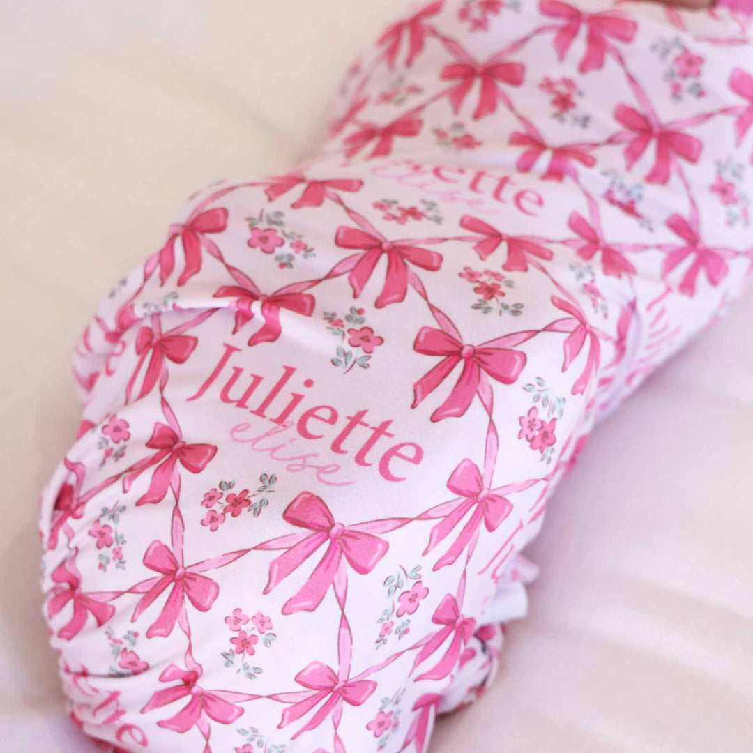 bow and flower personalized swaddle for newborn girls 