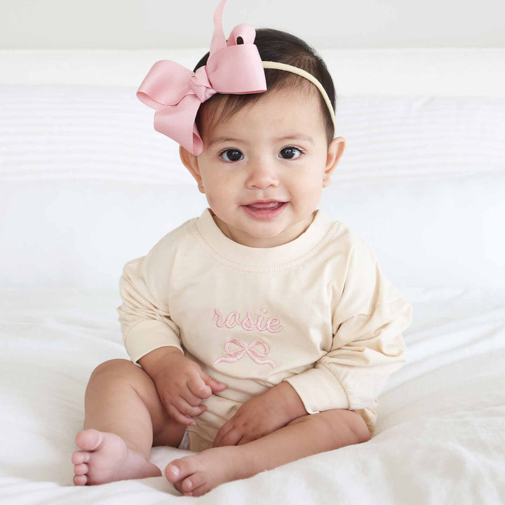 bow embroidered long sleeve bubble romper 