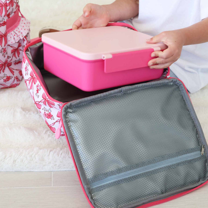 hot pink bow, flower and polka trim embroidered lunchbox with name with hot pink thread 