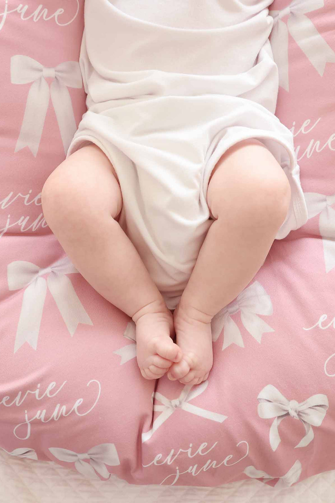 pink personalized swaddle for babies with bows 
