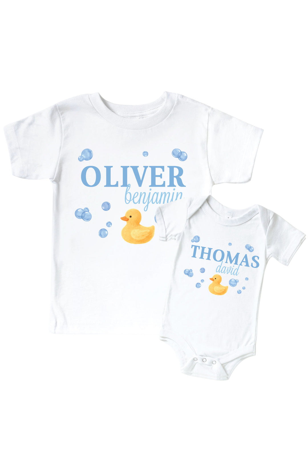 White kids tee and baby bodysuit with personalized blue bubble duckie graphic design showing yellow rubber duck with blue bubbles and custom name
