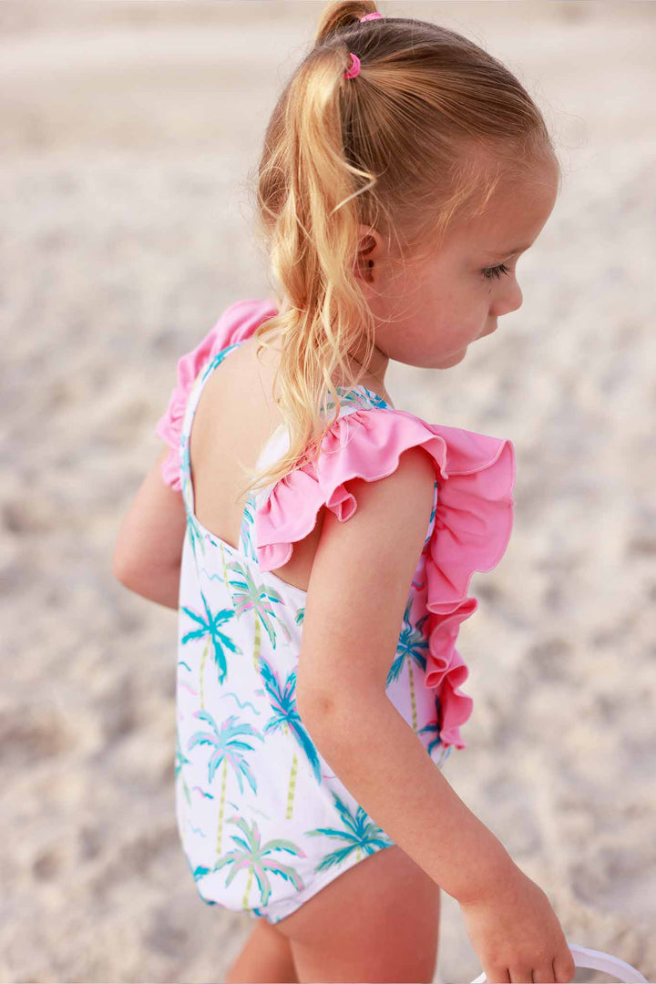 side view of blue lagoon double ruffle one piece with bright pink ruffles