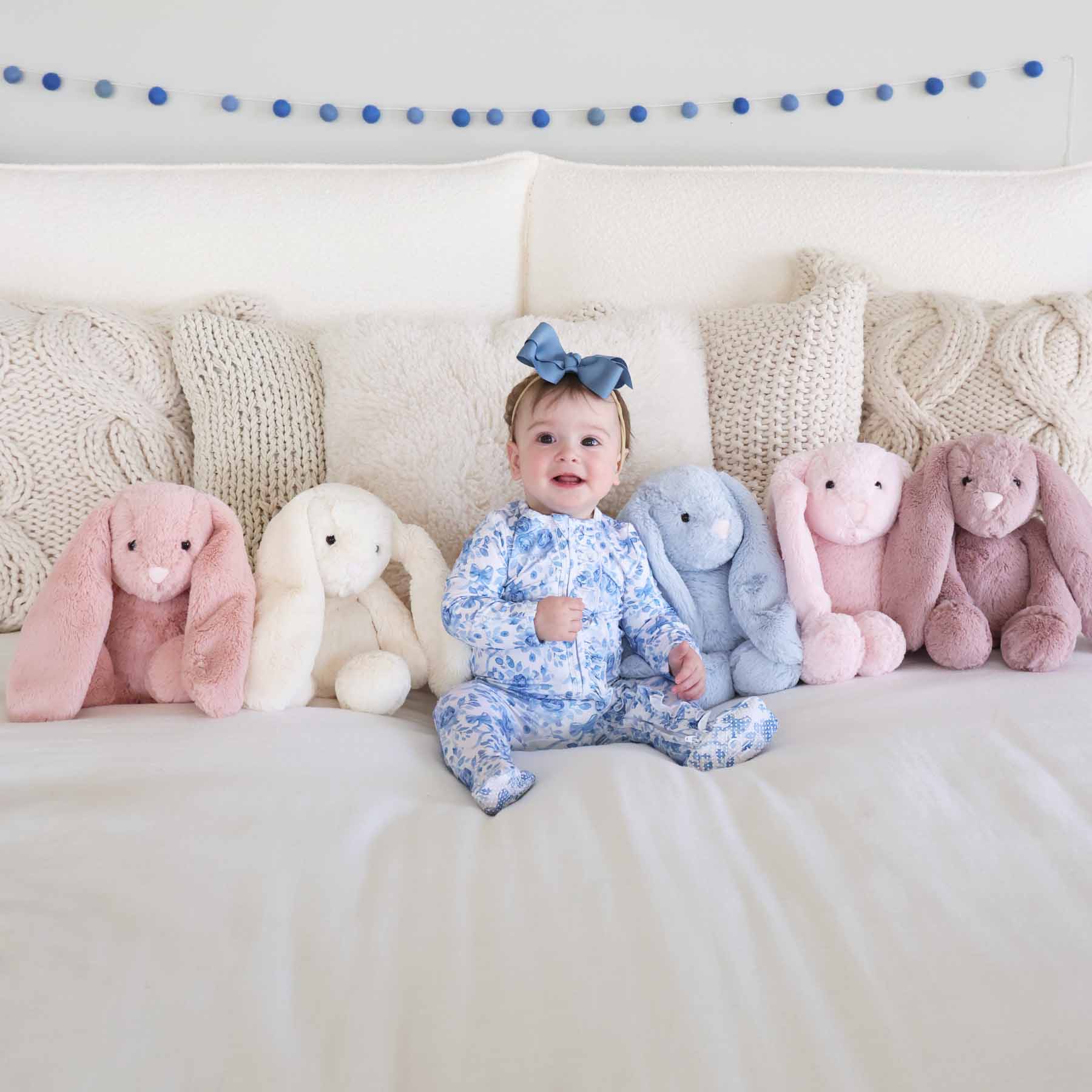 colored bunny stuffed animal with betsy's blooms zipper footie