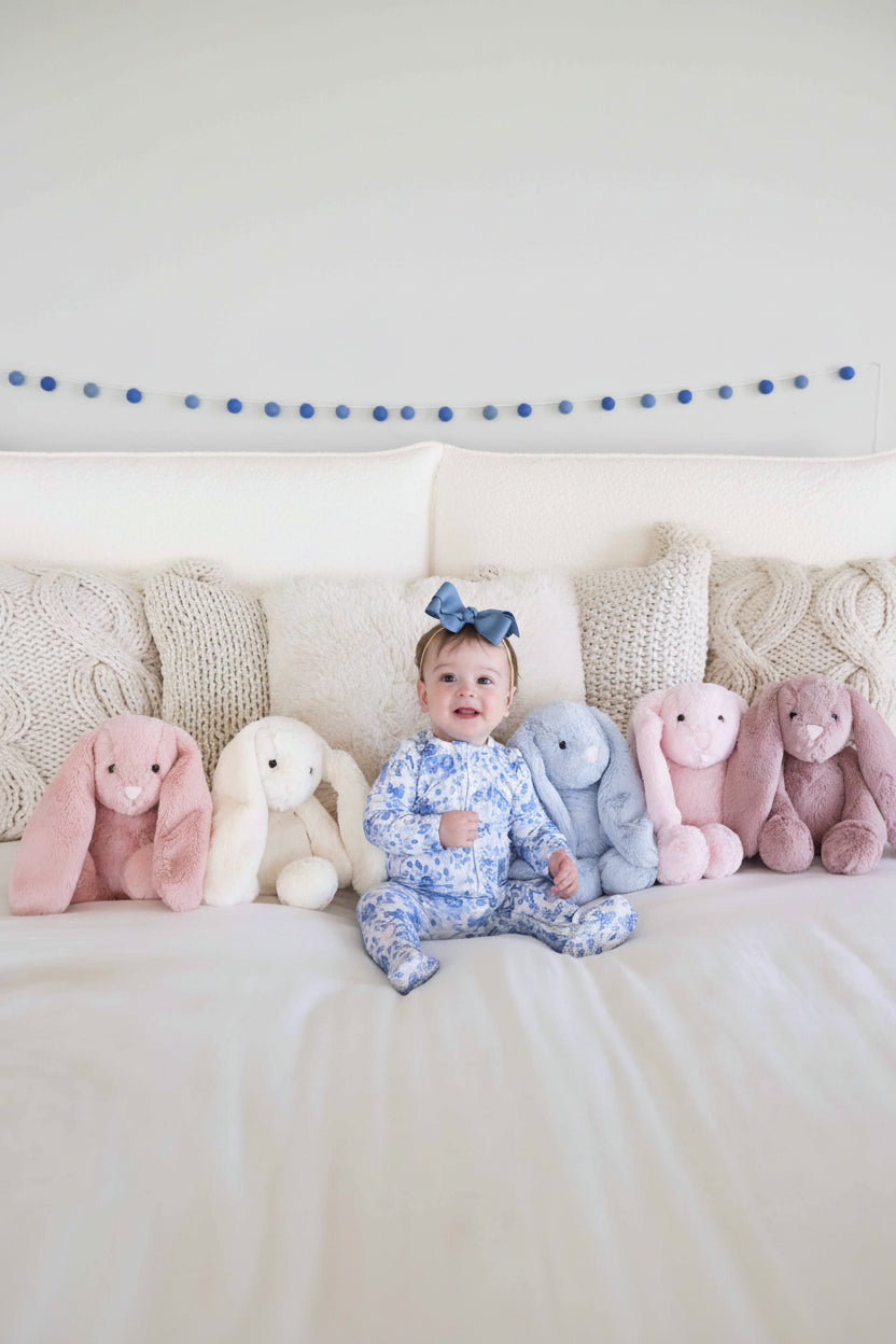 group of colorful bunny stuffed animals for kids and babies 