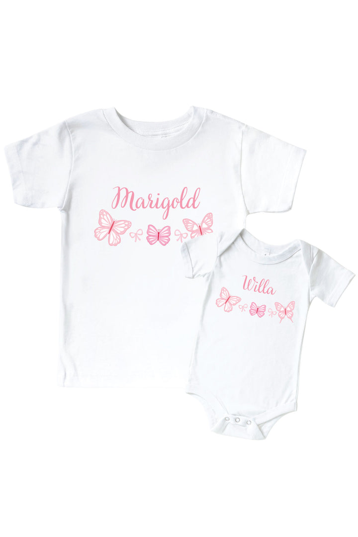 Personalized Blooming Butterflies Graphic Bodysuit & Kids Tee in White - white kids tee and baby bodysuit shown together, each personalized with a name and pink butterfly graphic