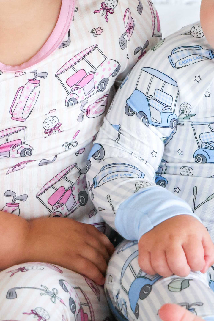 closeup of caddie crew sibling matching pajamas